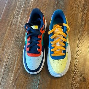 Mismatched kids nike Air Force sneakers!
